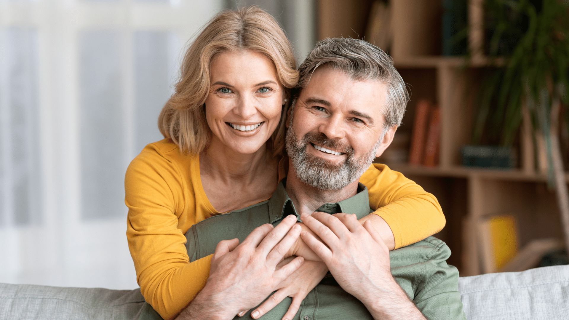 Smiling adult couple at home for adult orthodontic treatment at Bernhardt & Smith Orthodontics, Bishop Drive Office and 50th Street Office in West Des Moines, IA