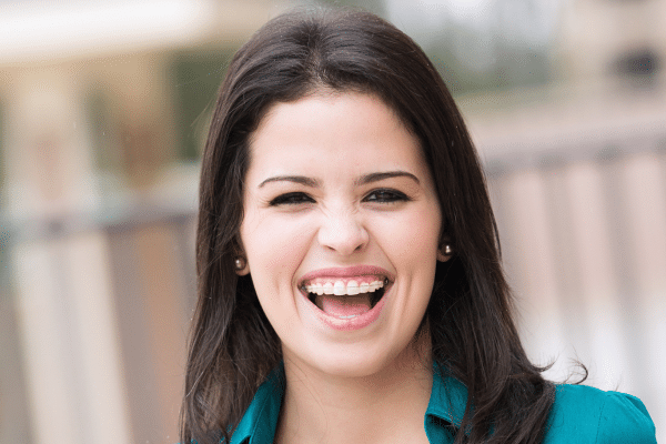 Smiling adult patient for adult orthodontic treatment at Bernhardt & Smith Orthodontics, Bishop Drive Office and 50th Street Office in West Des Moines, IA